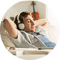 Boy relaxing while listening to music